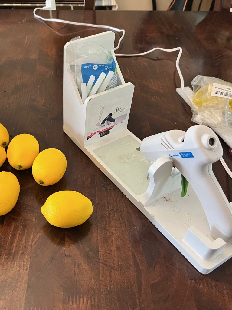 hot gluing the lemons